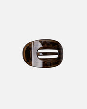 A single dark brown translucent hair claw clip with a glossy finish, shown against a plain white background.