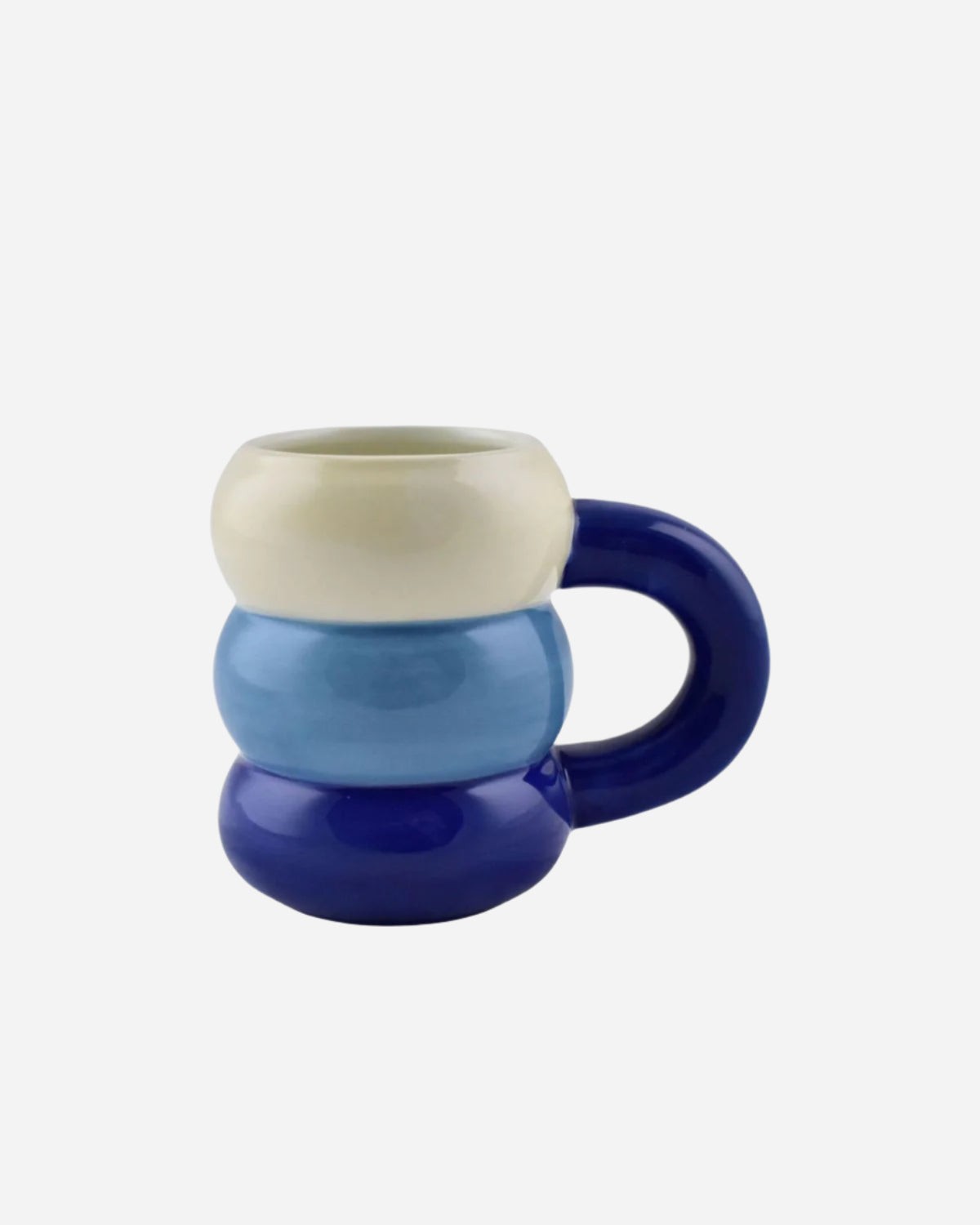 Color-blocked mug with a white top, blue middle, and dark blue bottom and handle on a white background