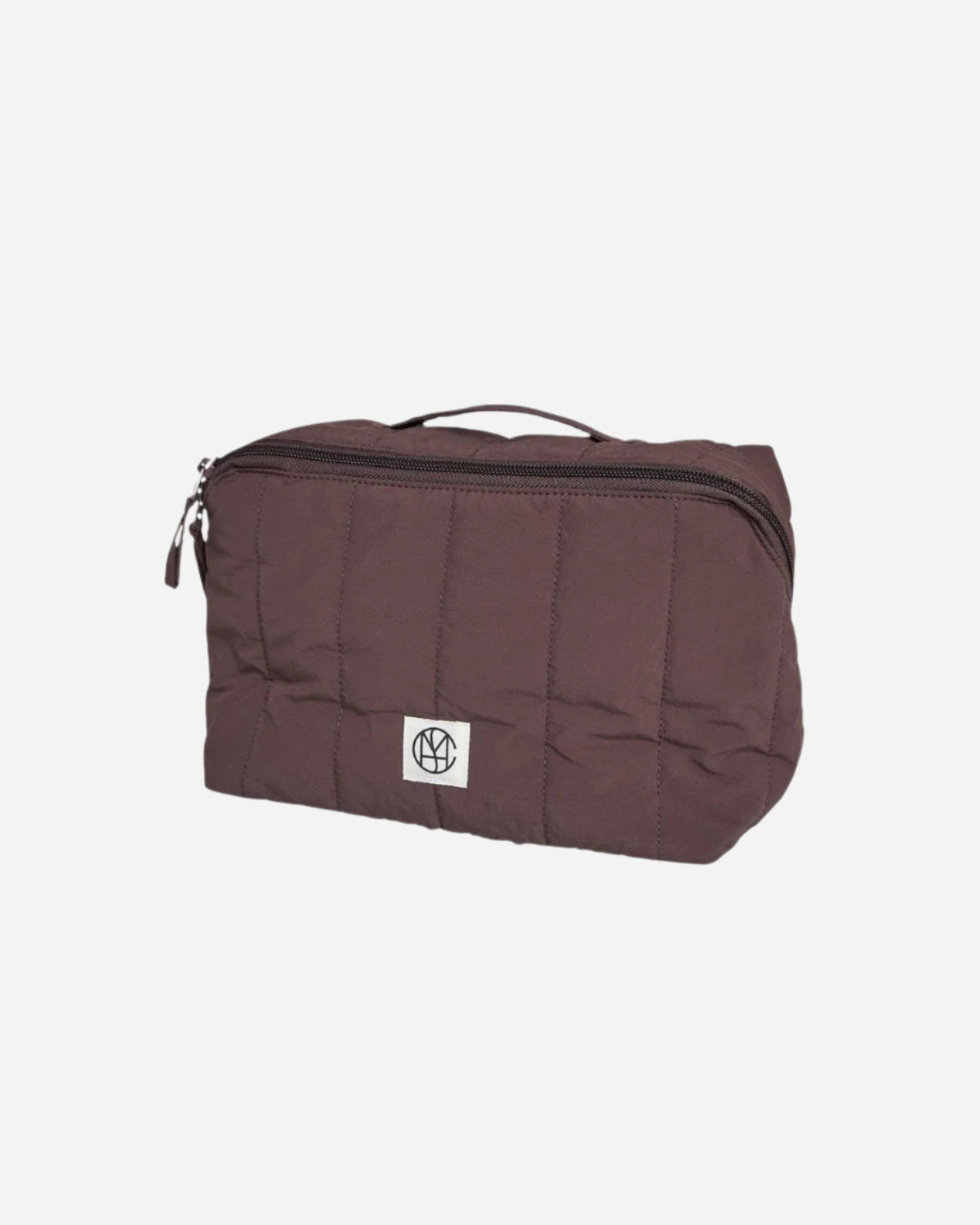 Brown toiletry bag with a visible brand logo on a light gray background