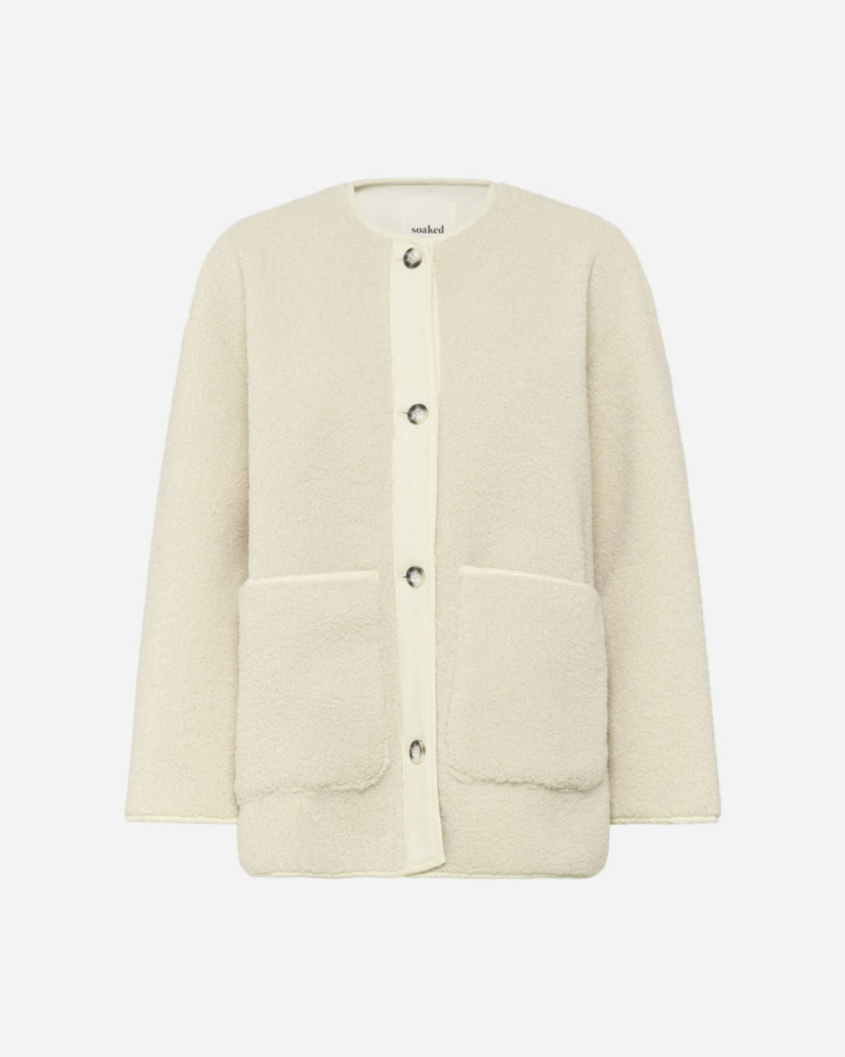 Cream boucle jacket with button details on a white background