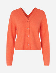 Orange cardigan on a white background
