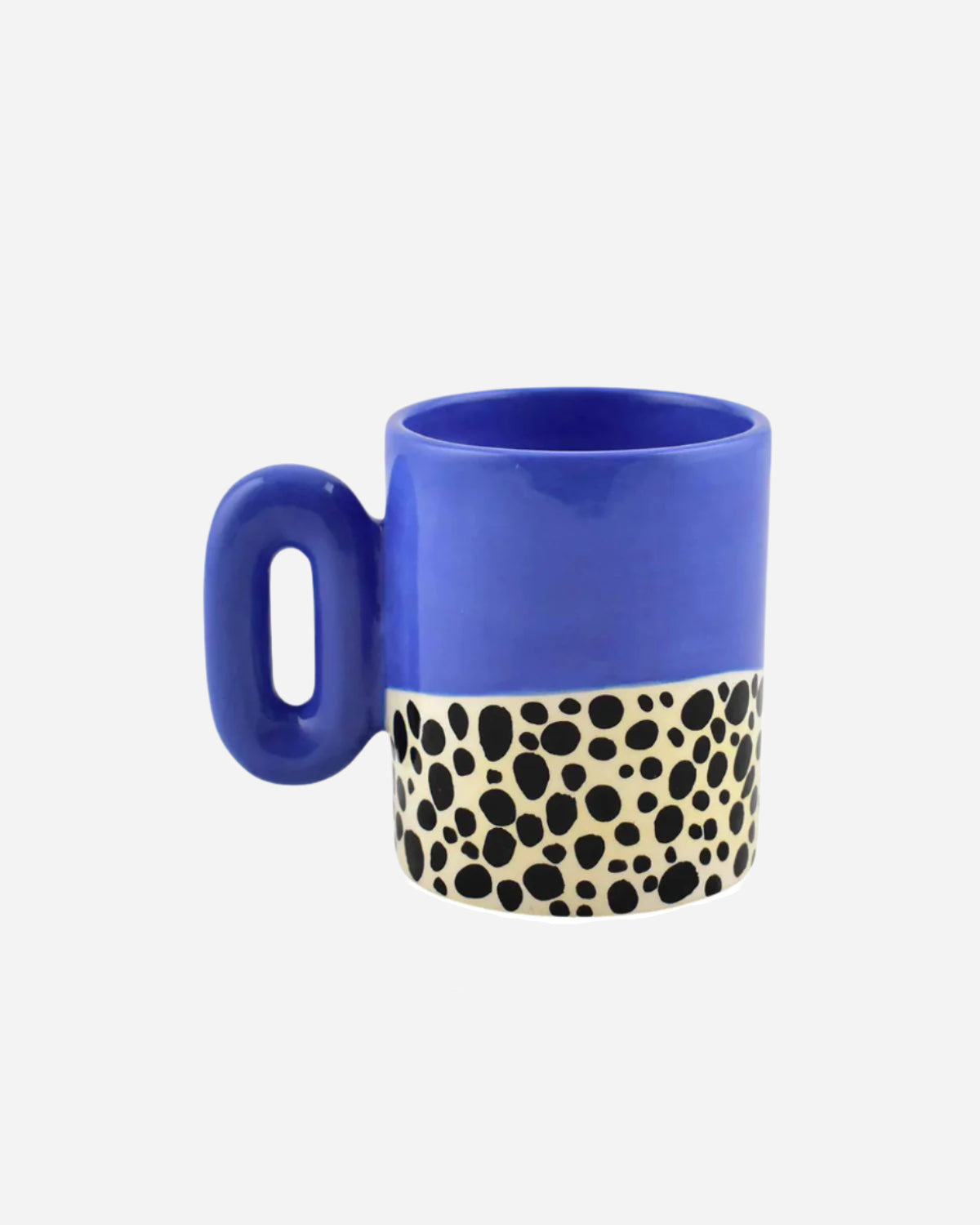 Blue mug with a spotted pattern on a white background