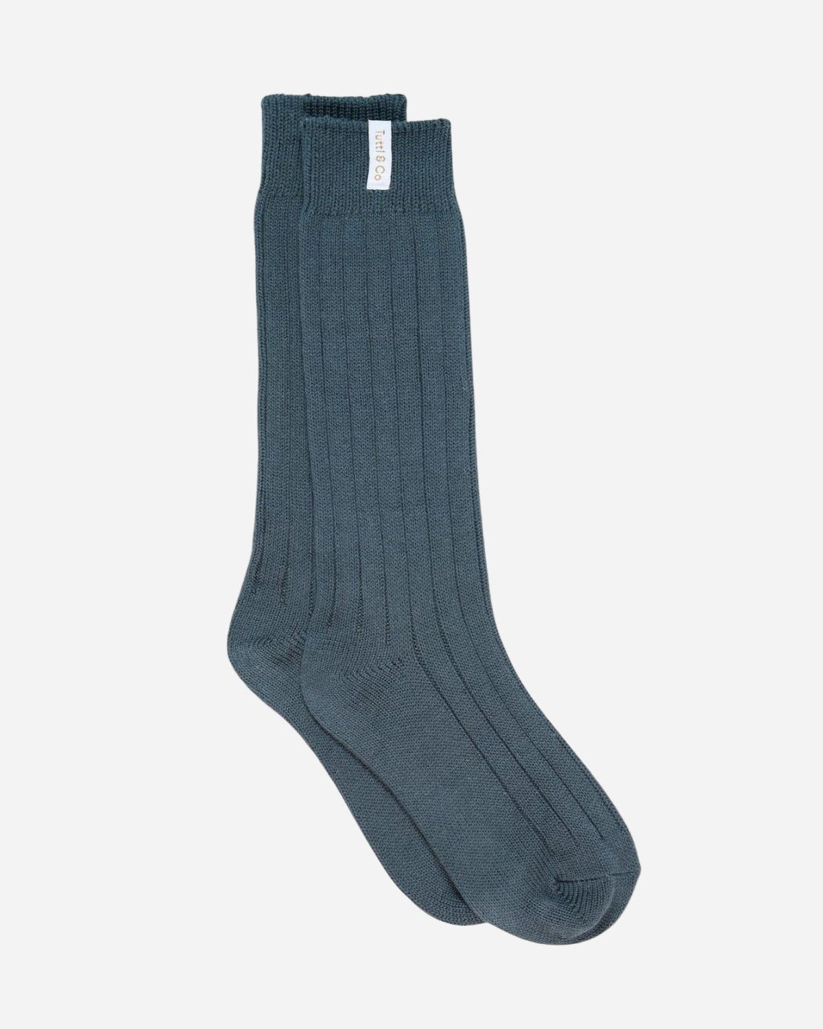 Pair of teal knee-high socks on a white background