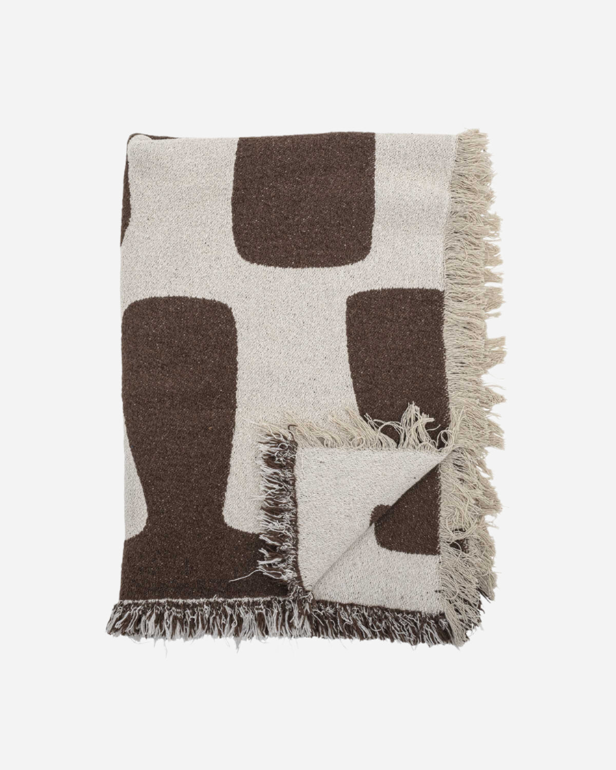 Brown and off white patterned throw