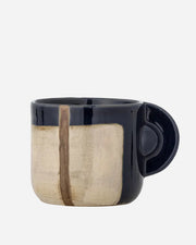 ceramic mugs with geometric design on a white background