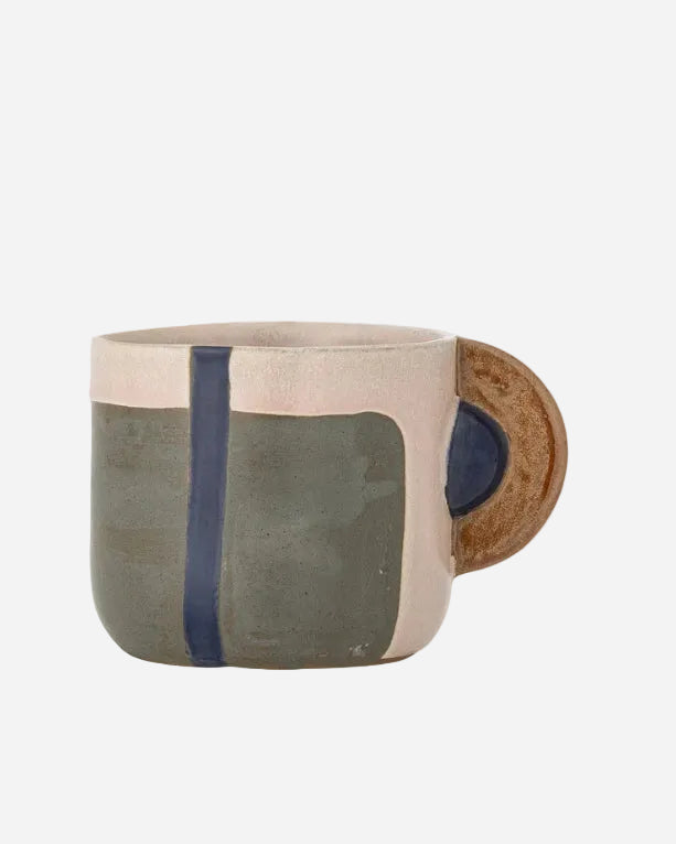 Ceramic  mugs with geometric design on a white background