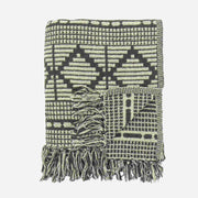 Green patterned throw with tassles