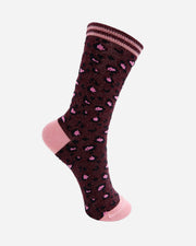 Sock with pink hearts on a white background