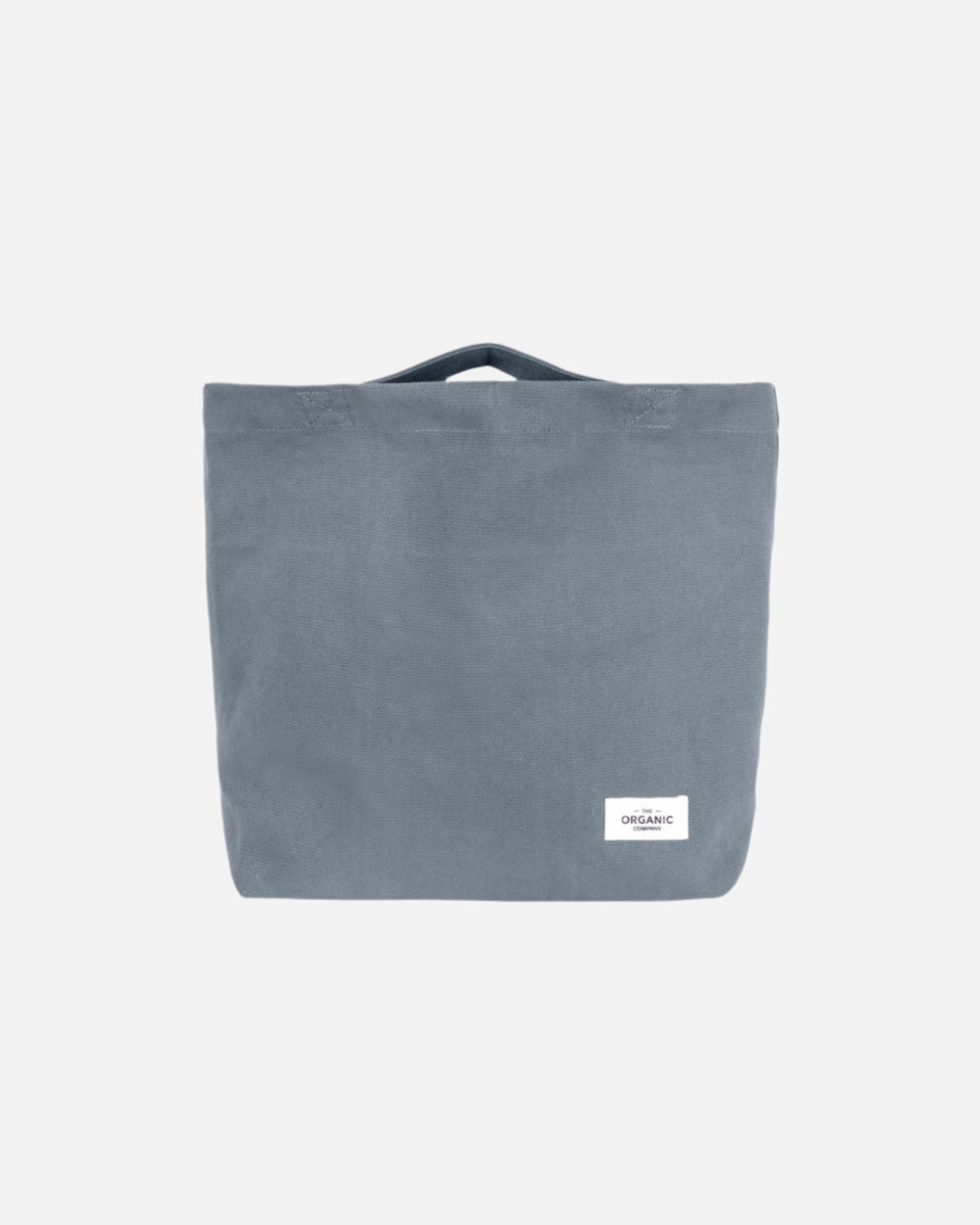 Dusty blue tote bag with a visible brand label 