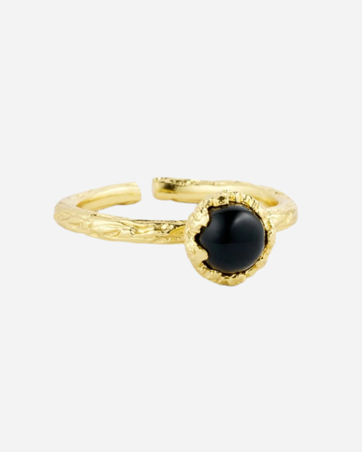 Gold ring with a black gemstone on a white background