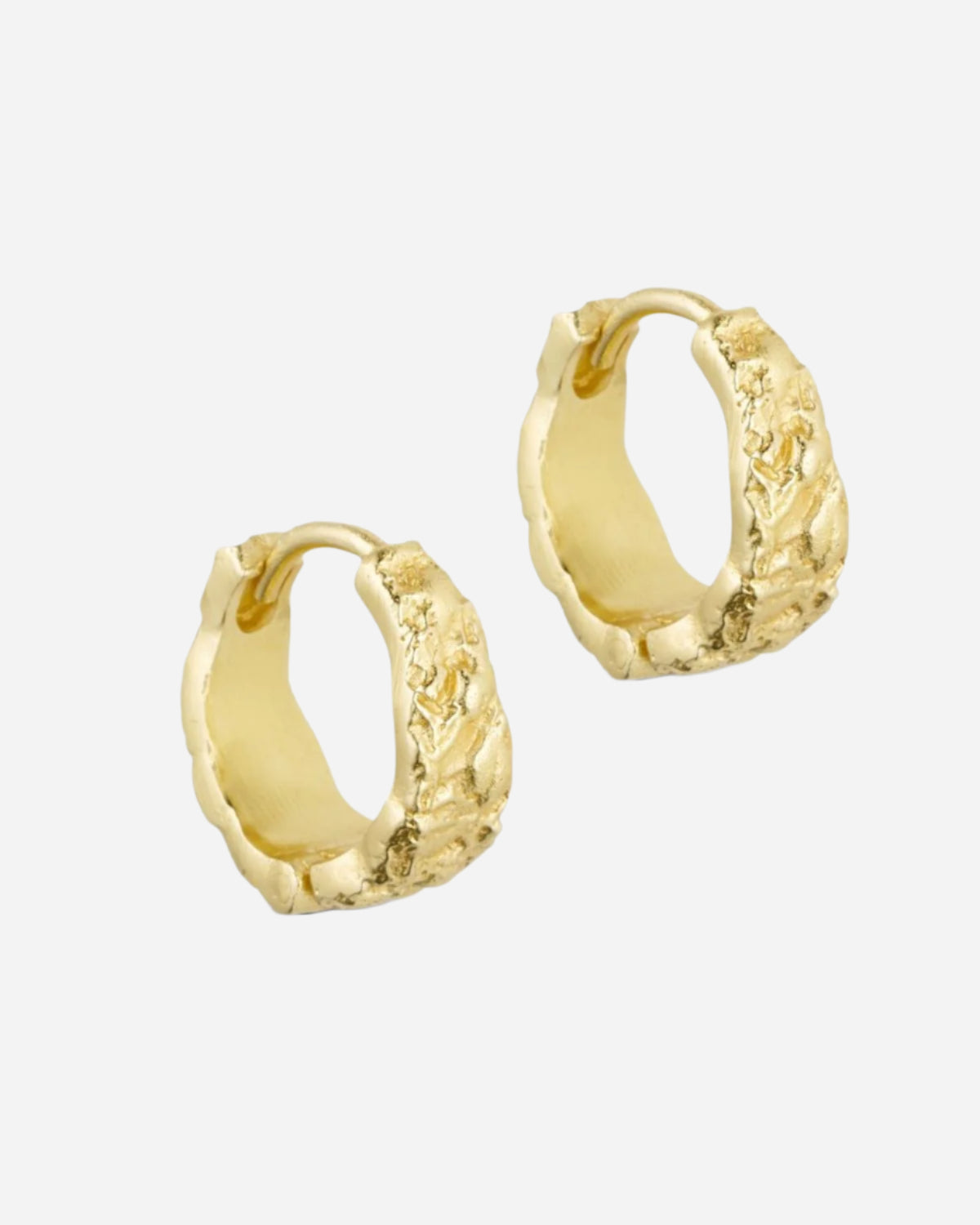 Gold hoop earrings on a white background