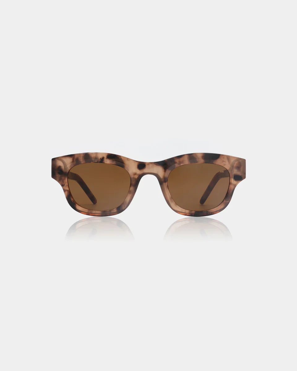 Narrow sunglasses with tortoiseshell frame