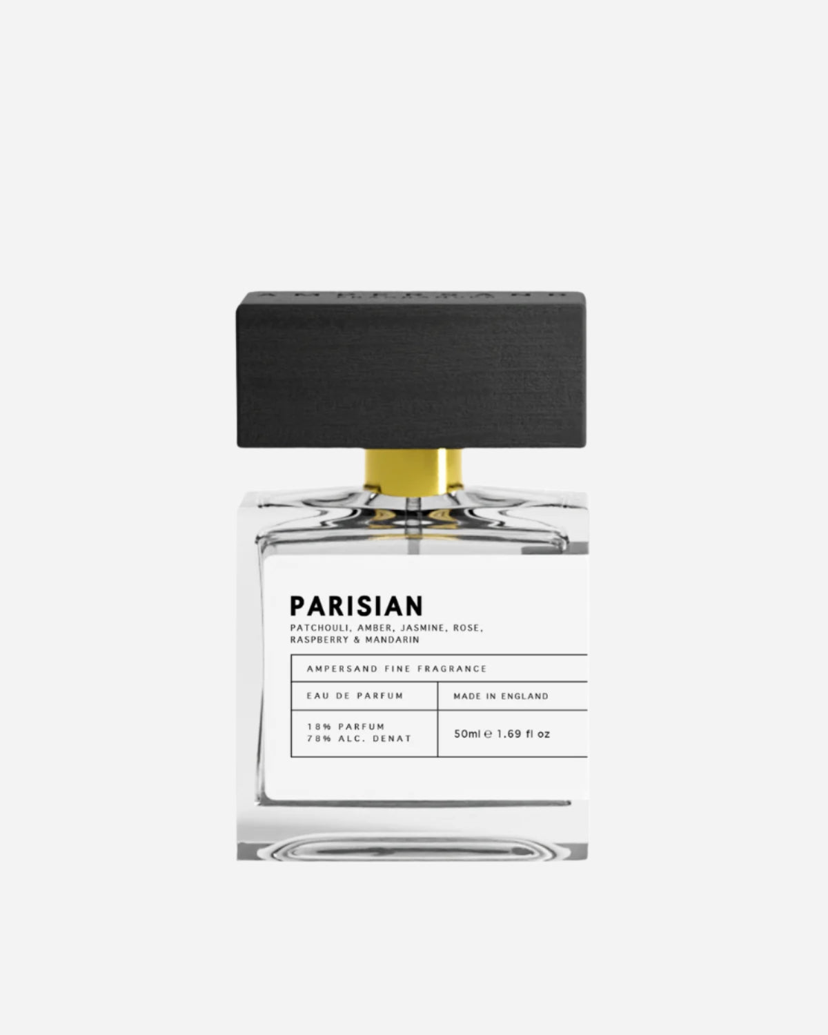 Clear perfume bottle with black and white printed label and black wooden cap with Ampersand engraving.