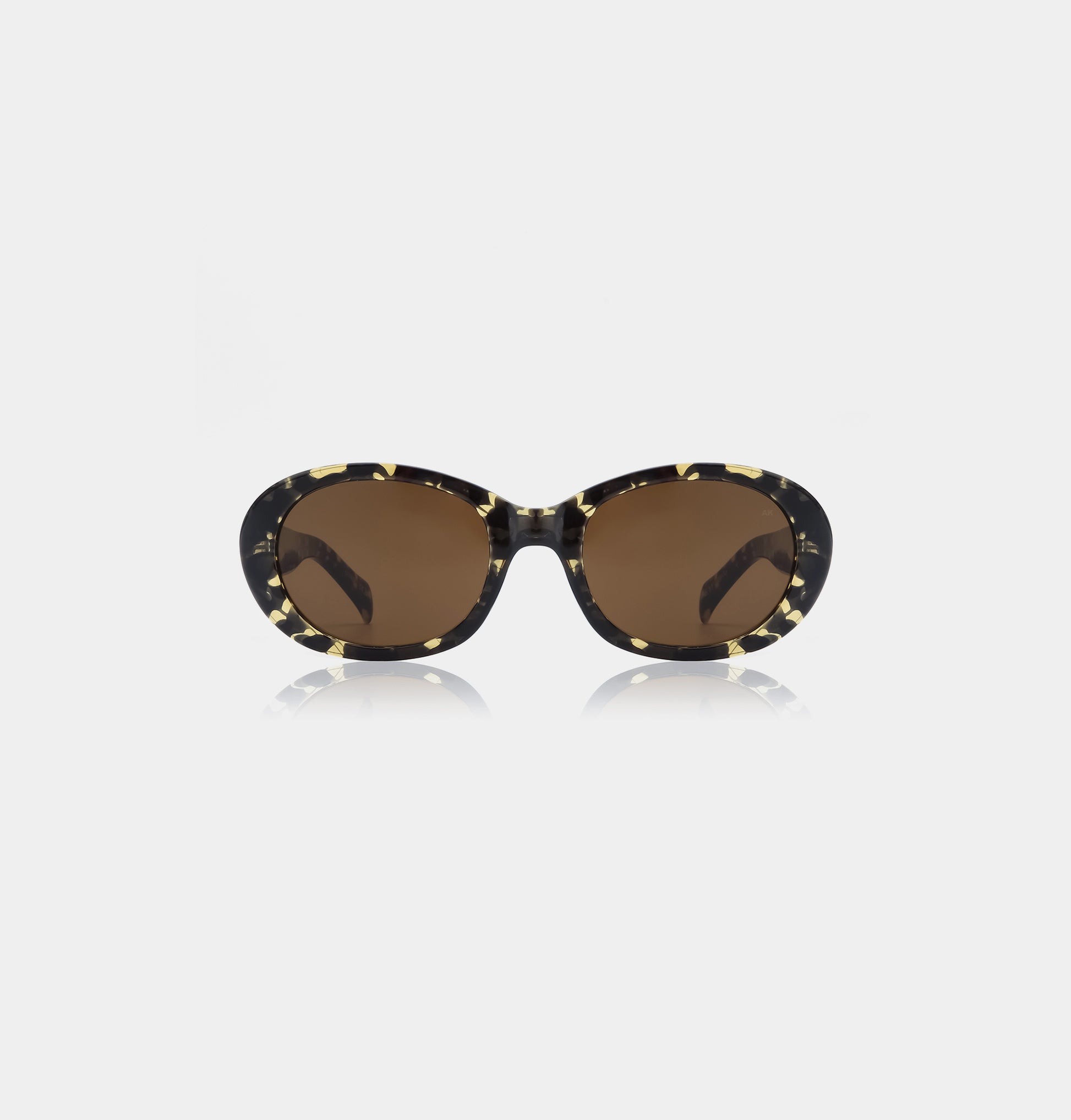 Oversized sunglasses with black and yellow tortoiseshell frames
