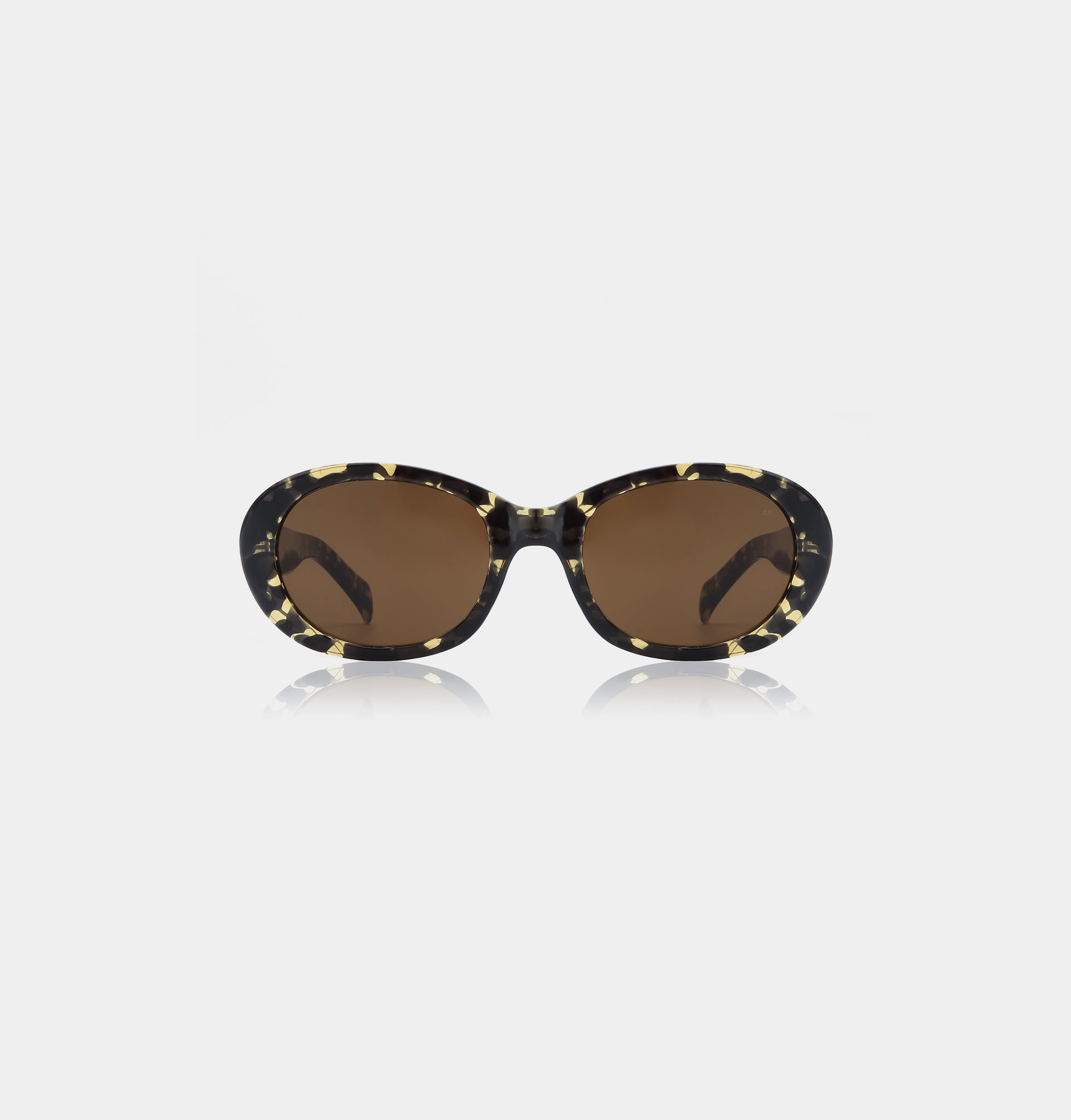 Oversized sunglasses with black and yellow tortoiseshell frames