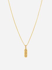 A gold-colored necklace with a delicate chain and a linear charm featuring cubic zirconia, attached to a box clasp.