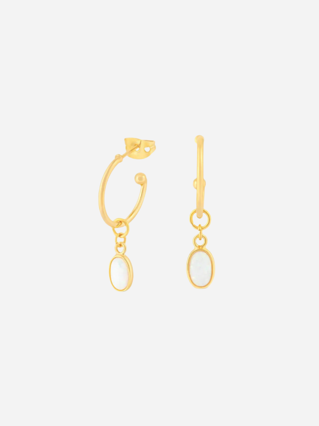 A pair of gold-colored hoop earrings with oval charms, displayed against a white background