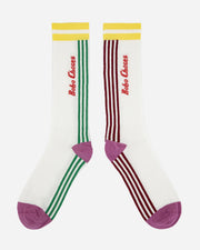 Two pairs of socks with different color patterns on a white background