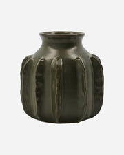 Dark green ceramic vase with textured surface on a white background