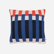 Decorative pillow with red, blue, and beige striped pattern on a white background