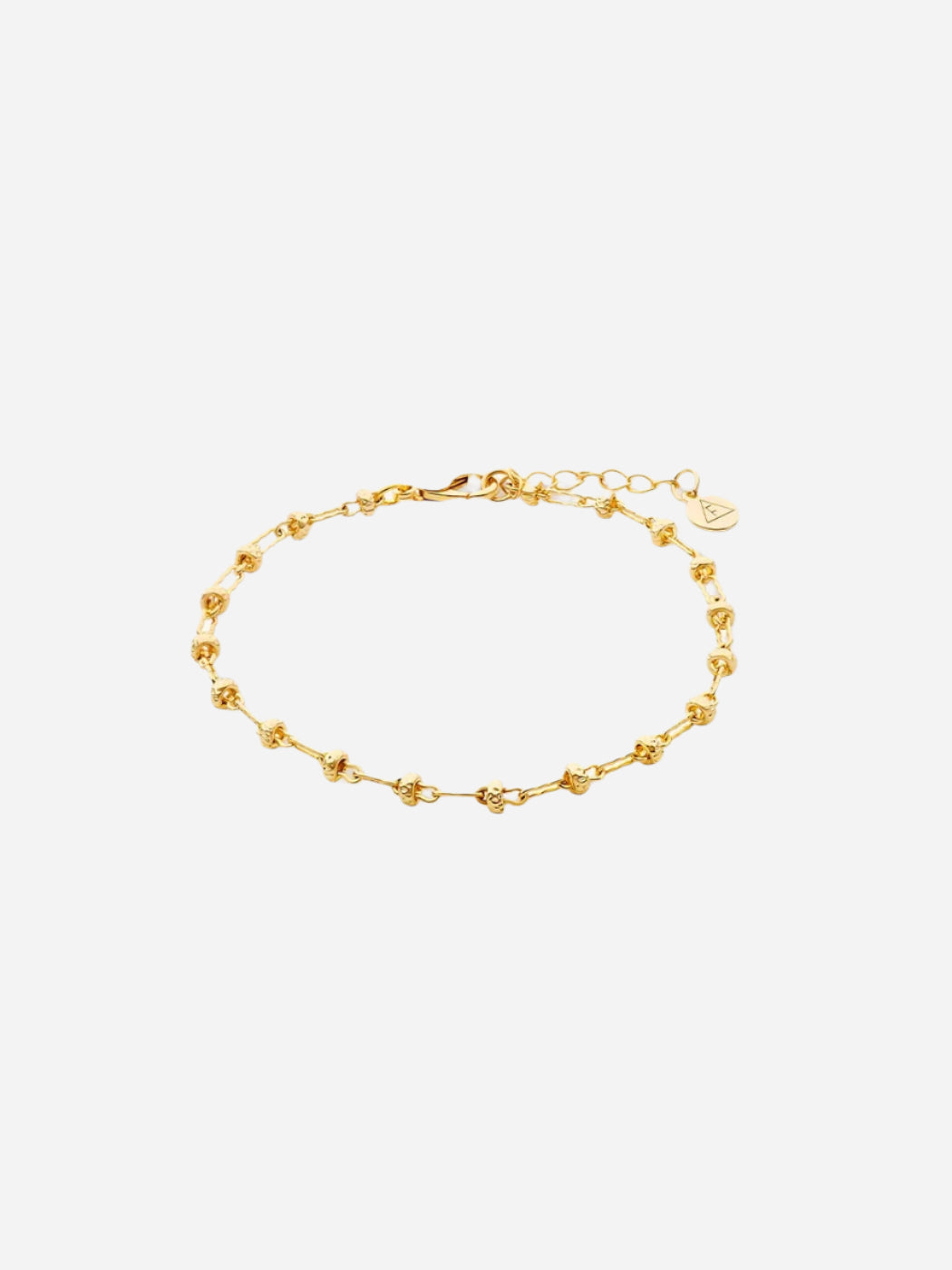 A gold-colored delicate chain bracelet with a dainty design, displayed against a white background.