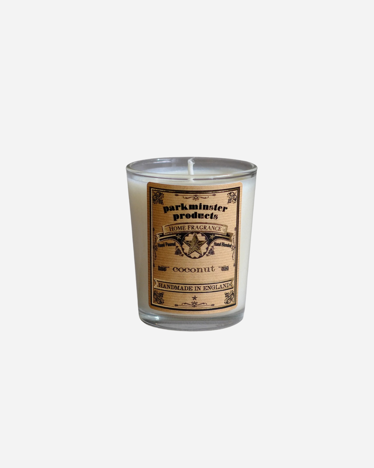 A clear glass mini votive candle with a label that reads 'Parkminster Products, Coconut, 7cm x 7cm, 15 hours burn time, 75g'.