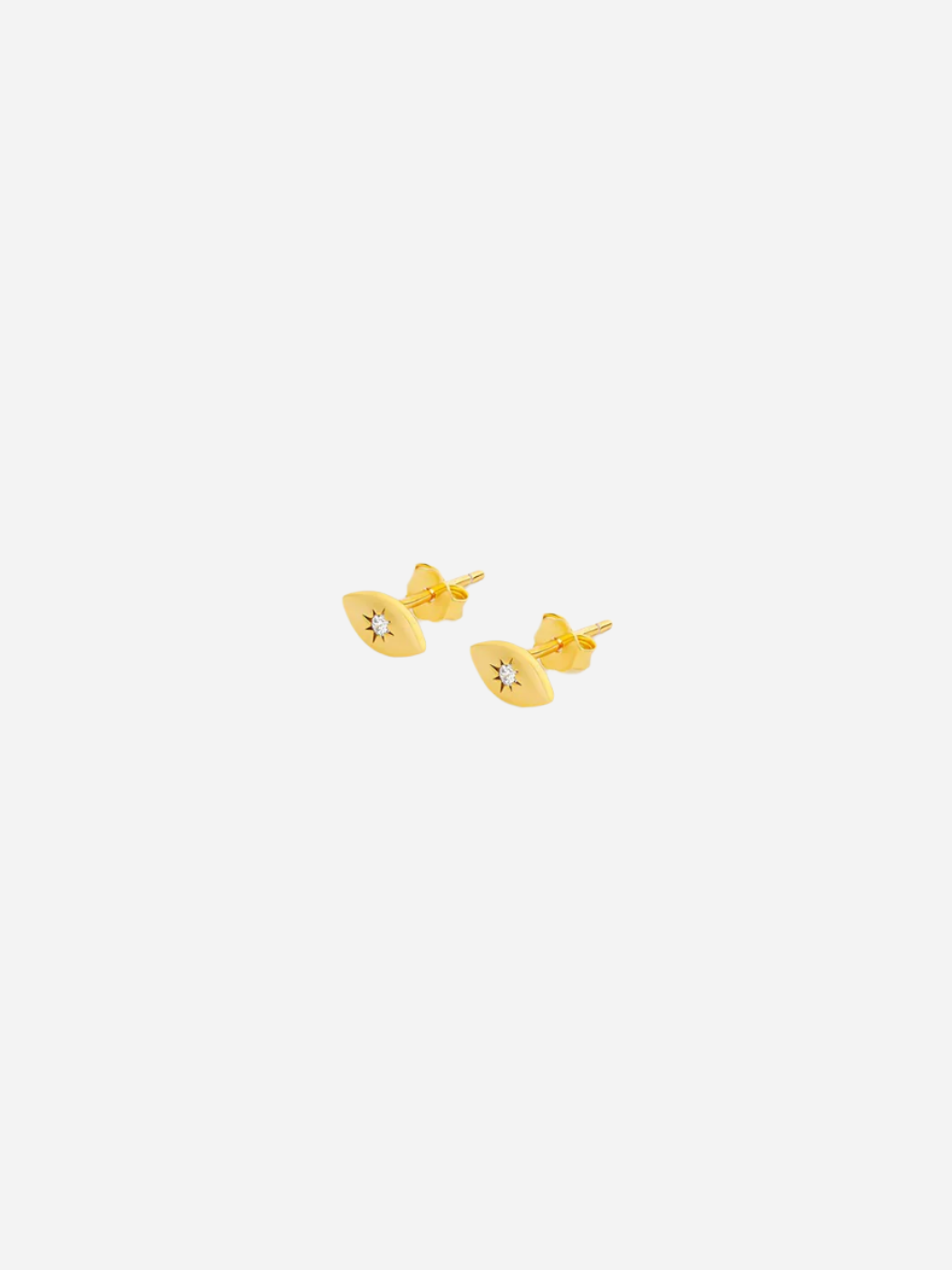 A pair of gold-colored stud earrings with cubic zirconia inlays, displayed against a white background.
