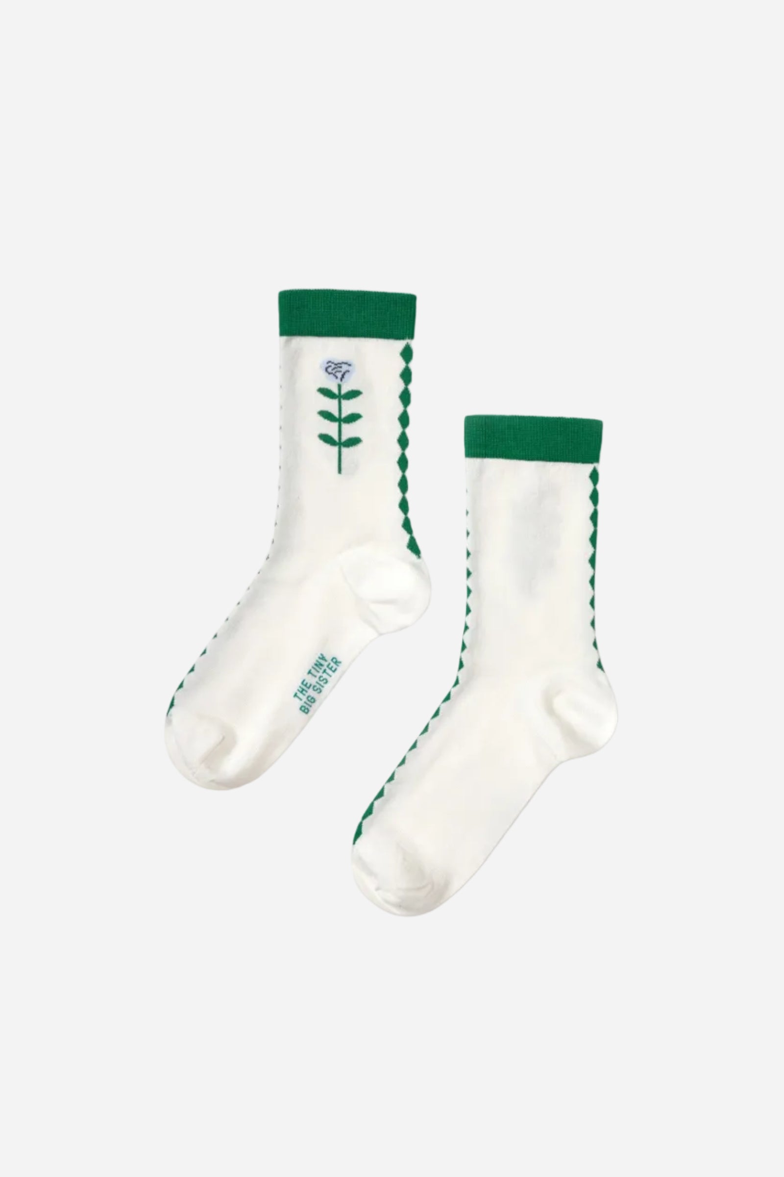 White socks with green accents on a white background