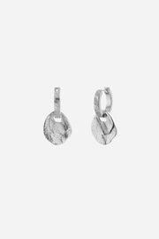 Pair of silver hoop earrings on a light gray background