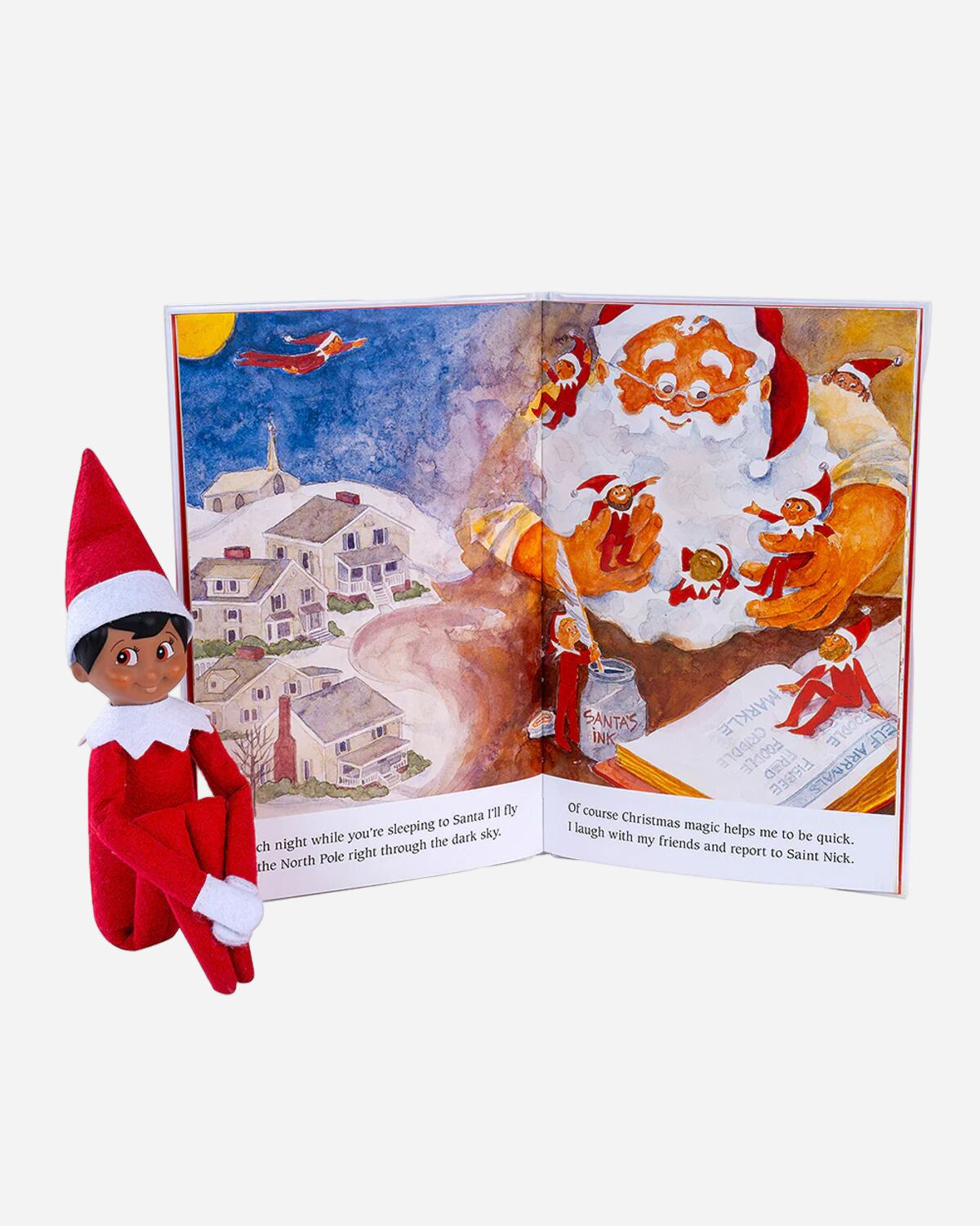 Elf on the Shelf with a Christmas-themed book