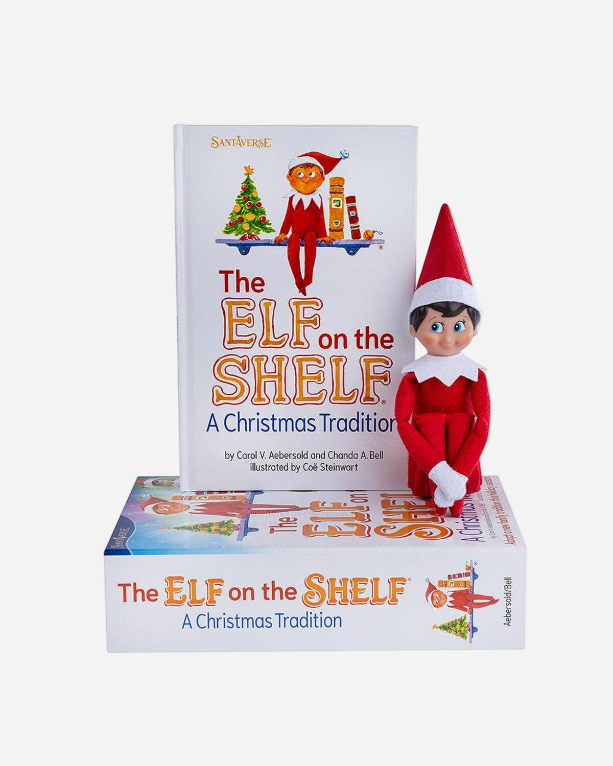 Elf on the Shelf figure with book titled 'The Elf on the Shelf: A Christmas Tradition' on a white background