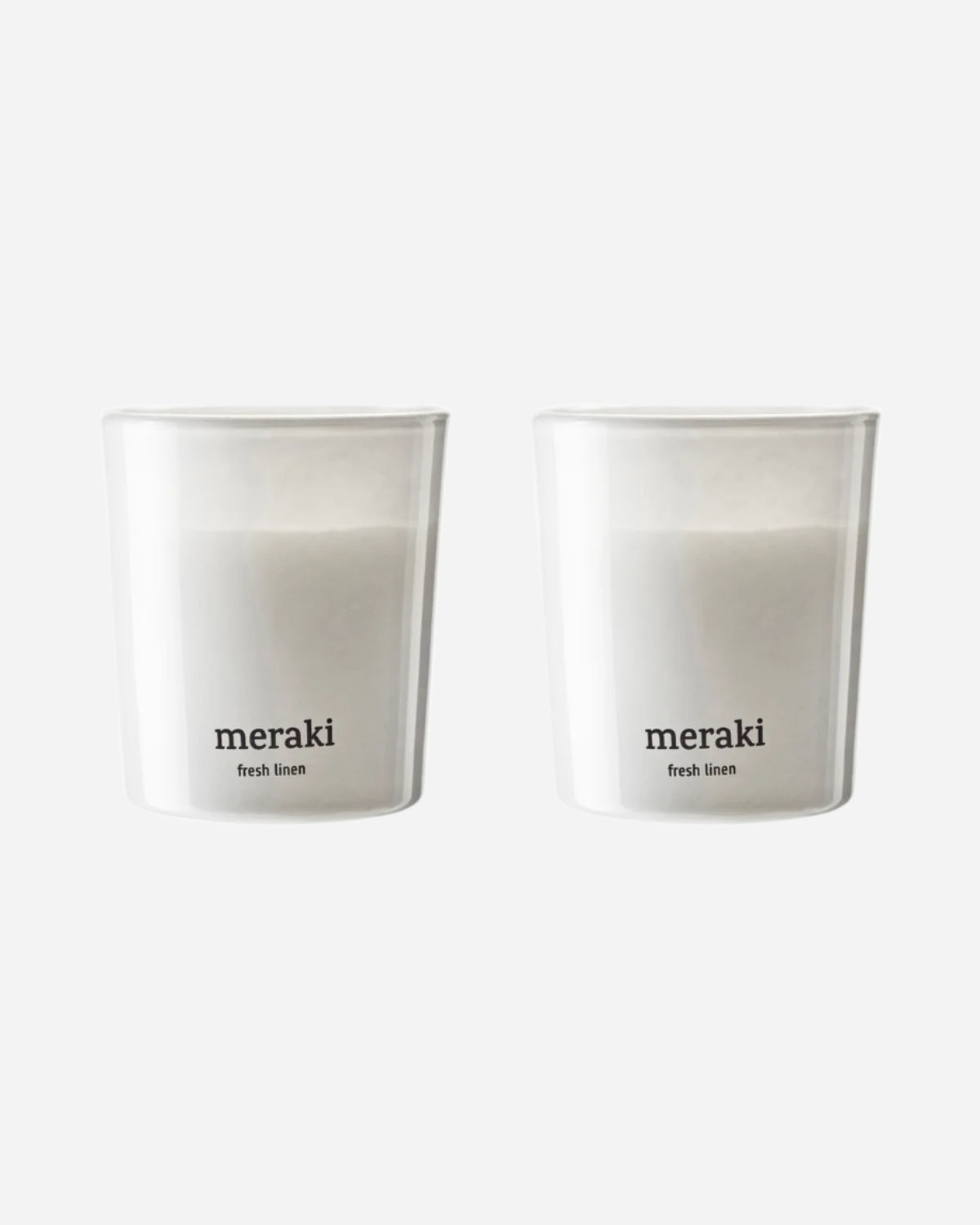 Two white scented candles in a minimalist design.