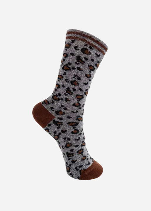 Gray sock with brown leopard print pattern on a white background