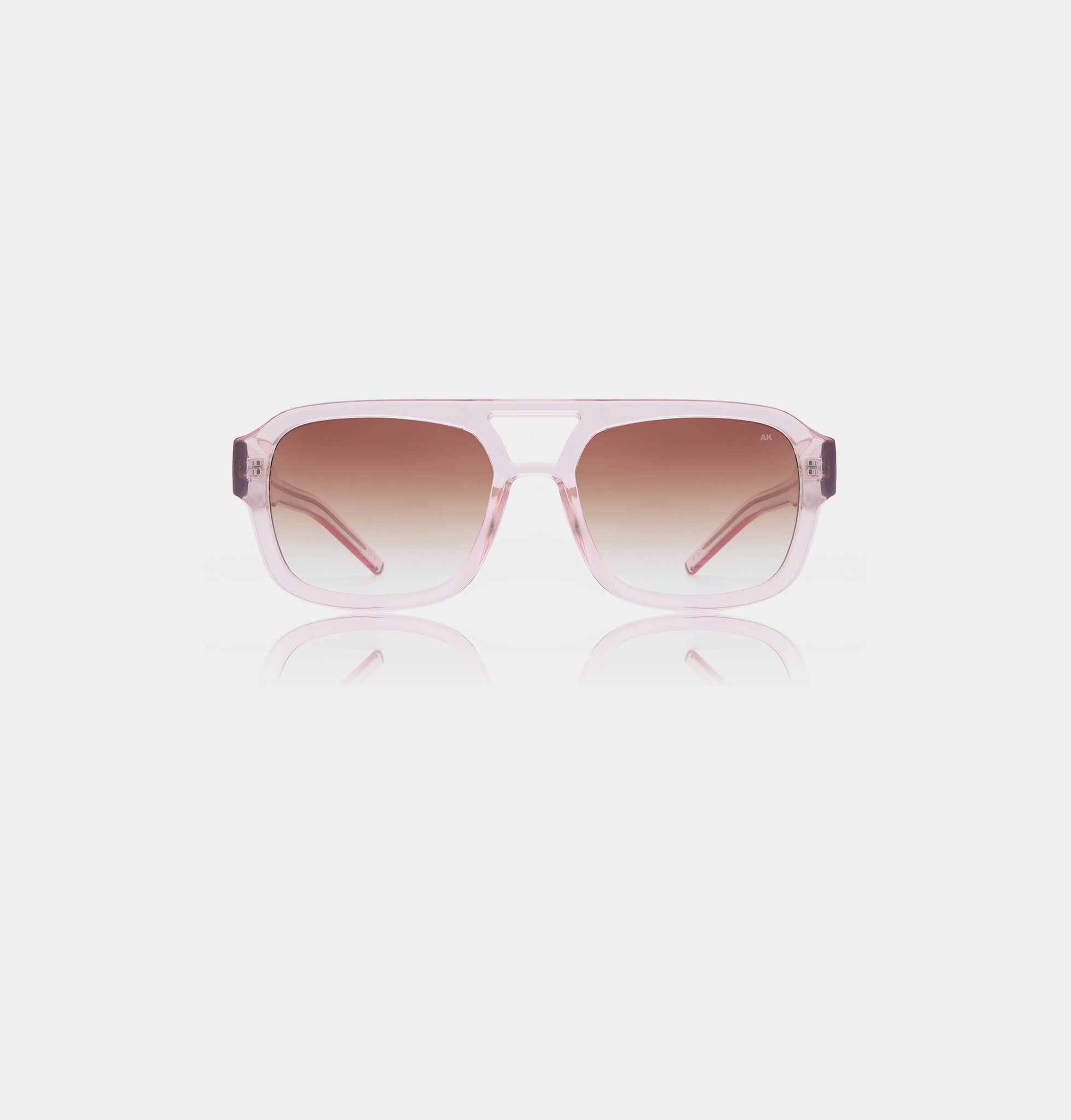 Pink aviator style sunglasses with pink lenses