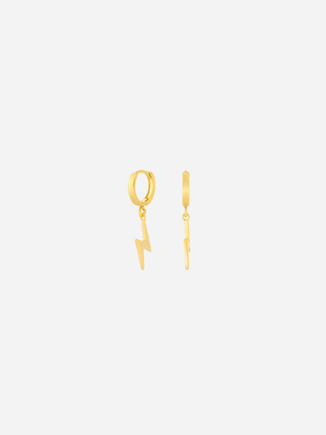 A pair of gold-colored huggie hoop earrings with lightning bolt charms attached to them, displayed against a white background.