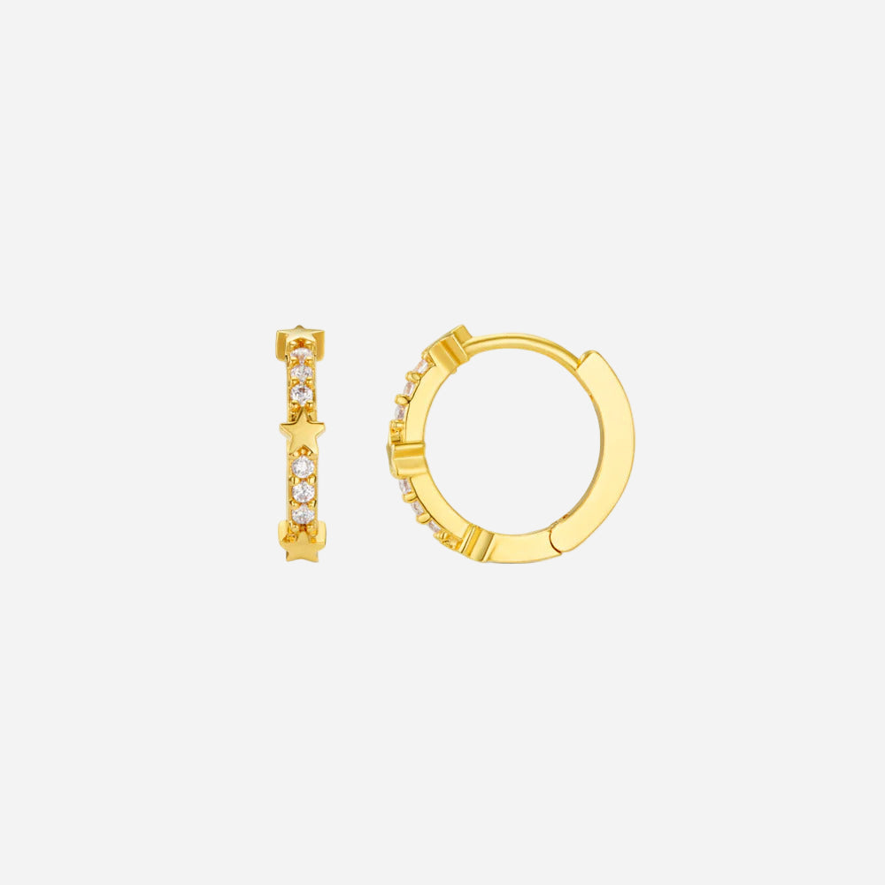 Gold hoop earrings with small diamonds on a white background