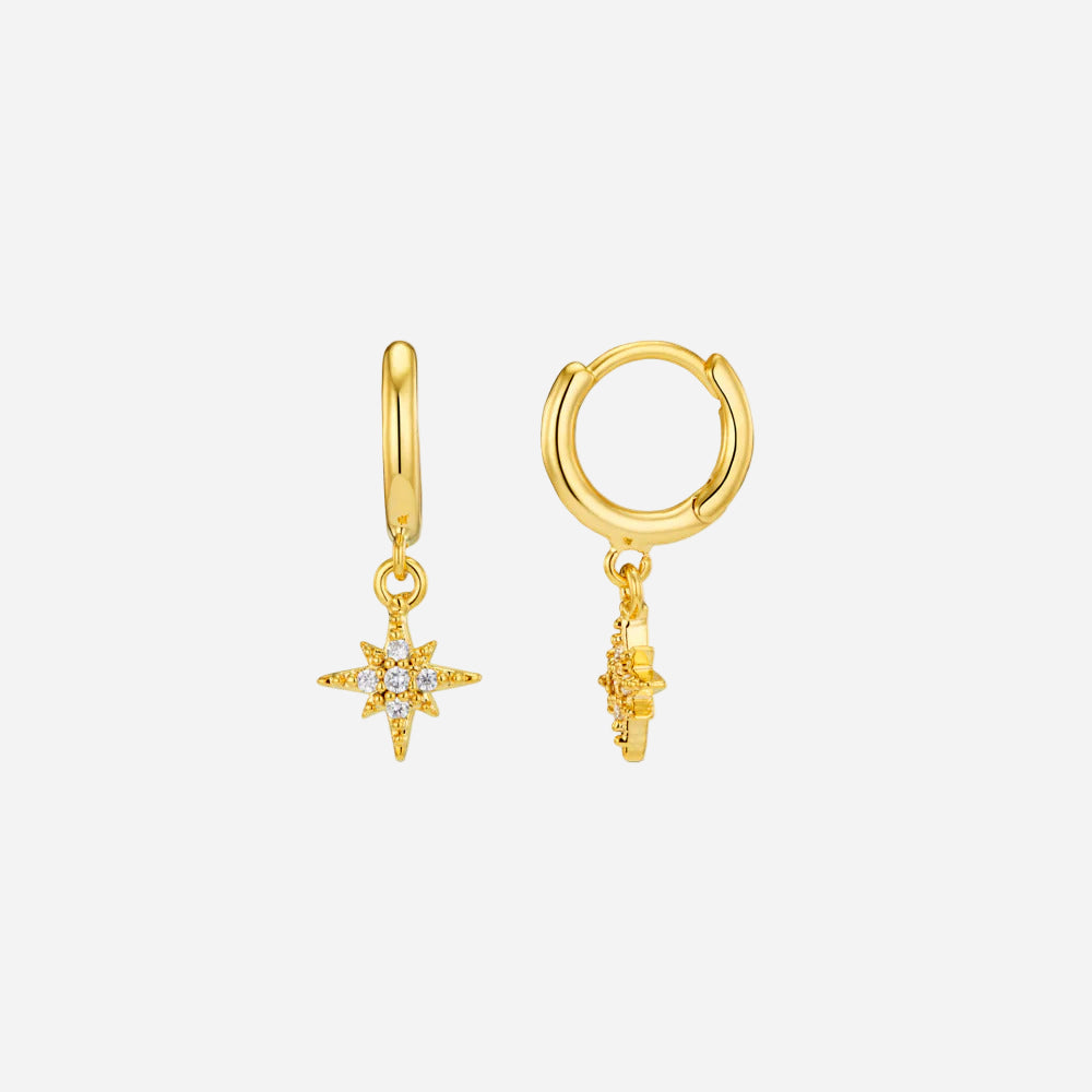 Gold hoop earrings with star-shaped charms on a white background