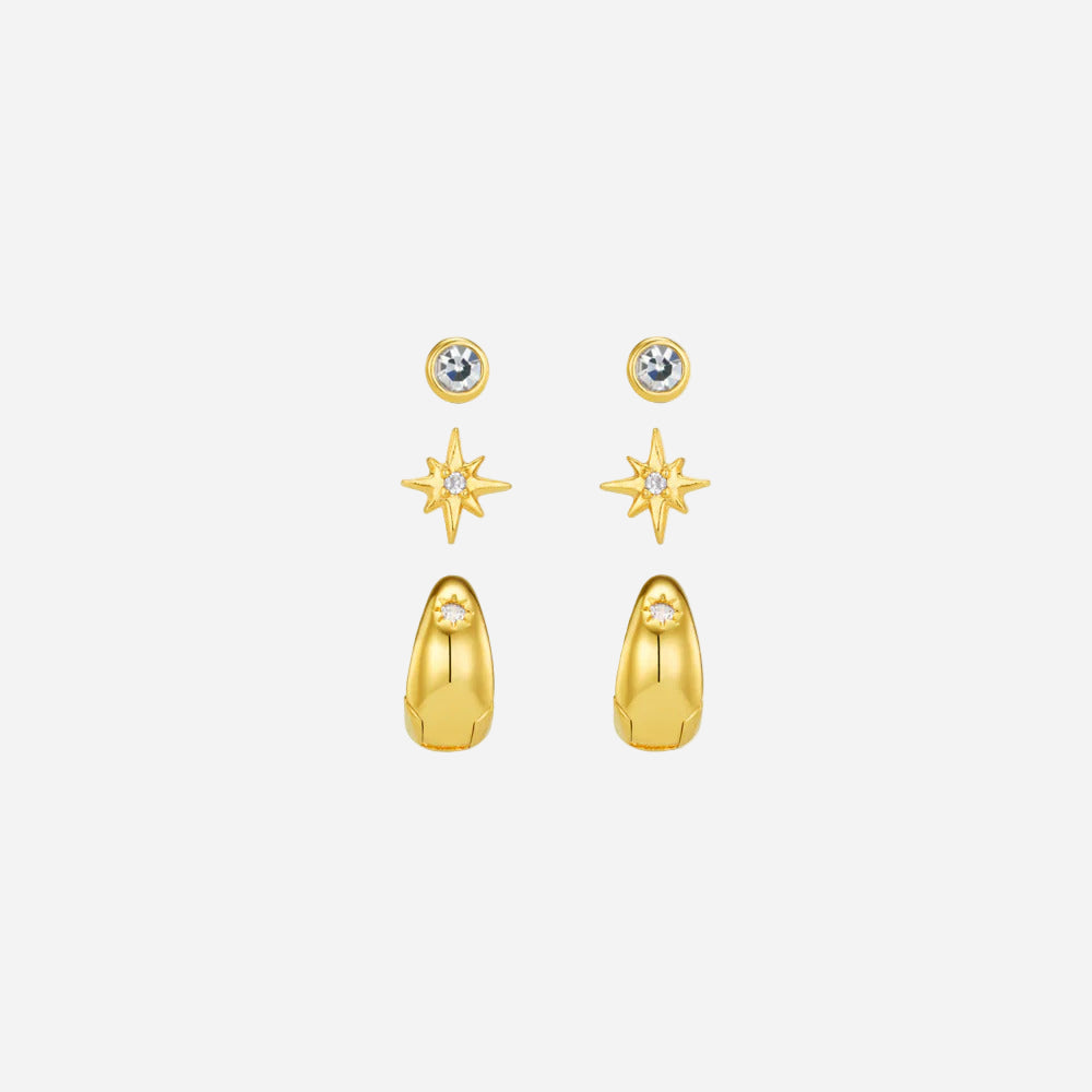 Gold earrings with star and teardrop designs on a white background