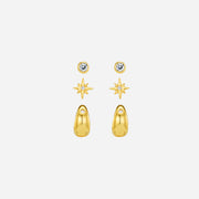 Gold earrings with star and teardrop designs on a white background