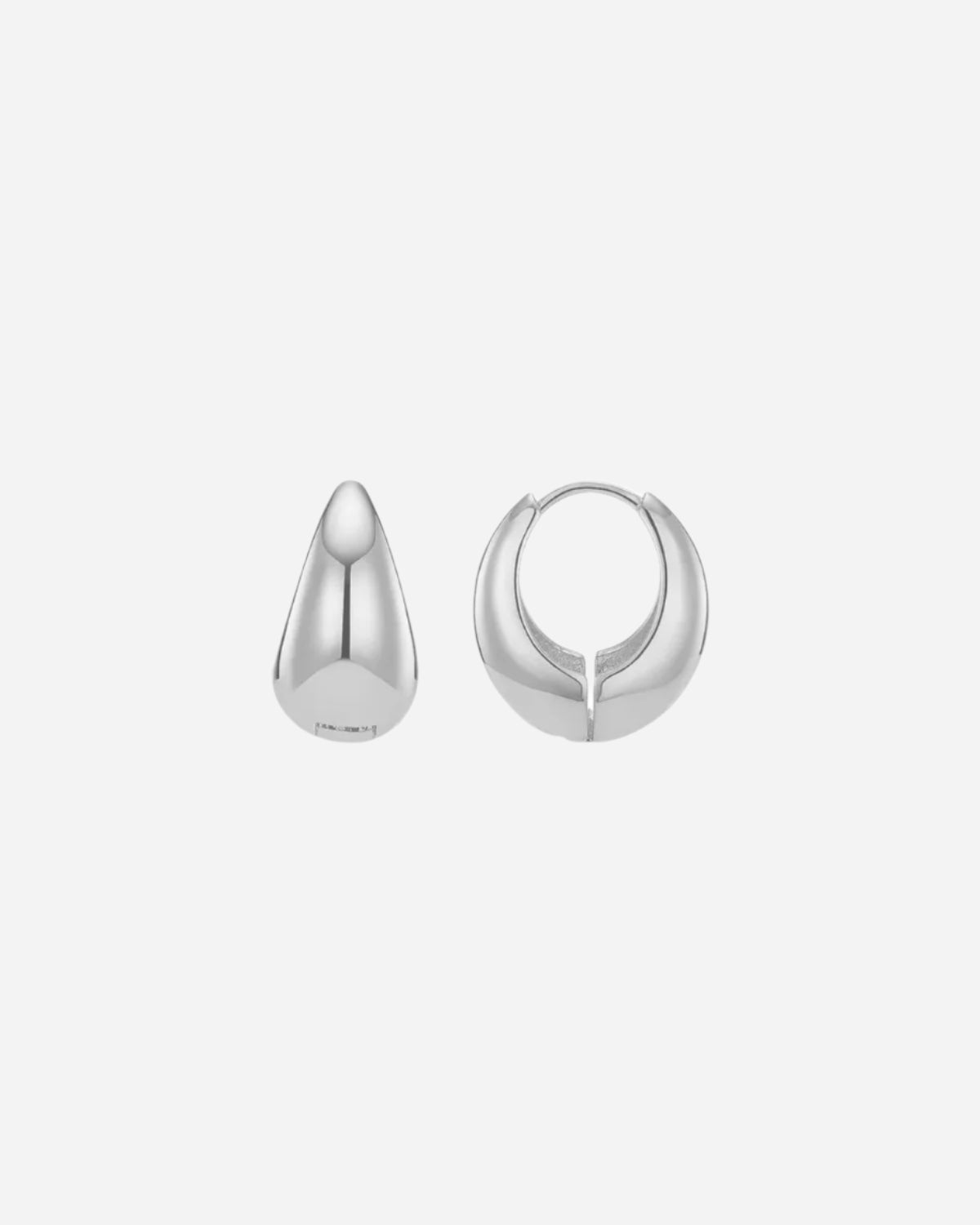 Two silver hoop earrings on a white background
