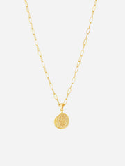 A gold-colored necklace with a hamsa hand pendant on an oval paperclip style chain.