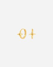 Gold hoop earrings on a white background