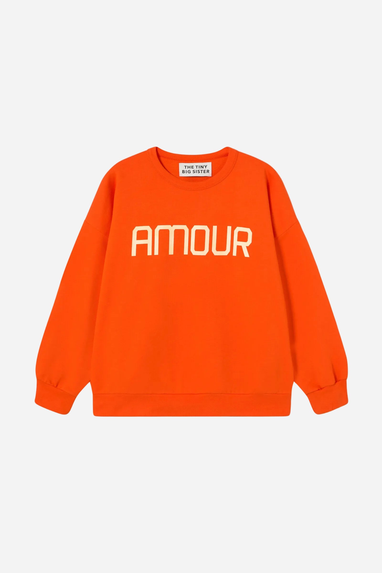Red sweatshirt with 'AMOUR' text on a white background