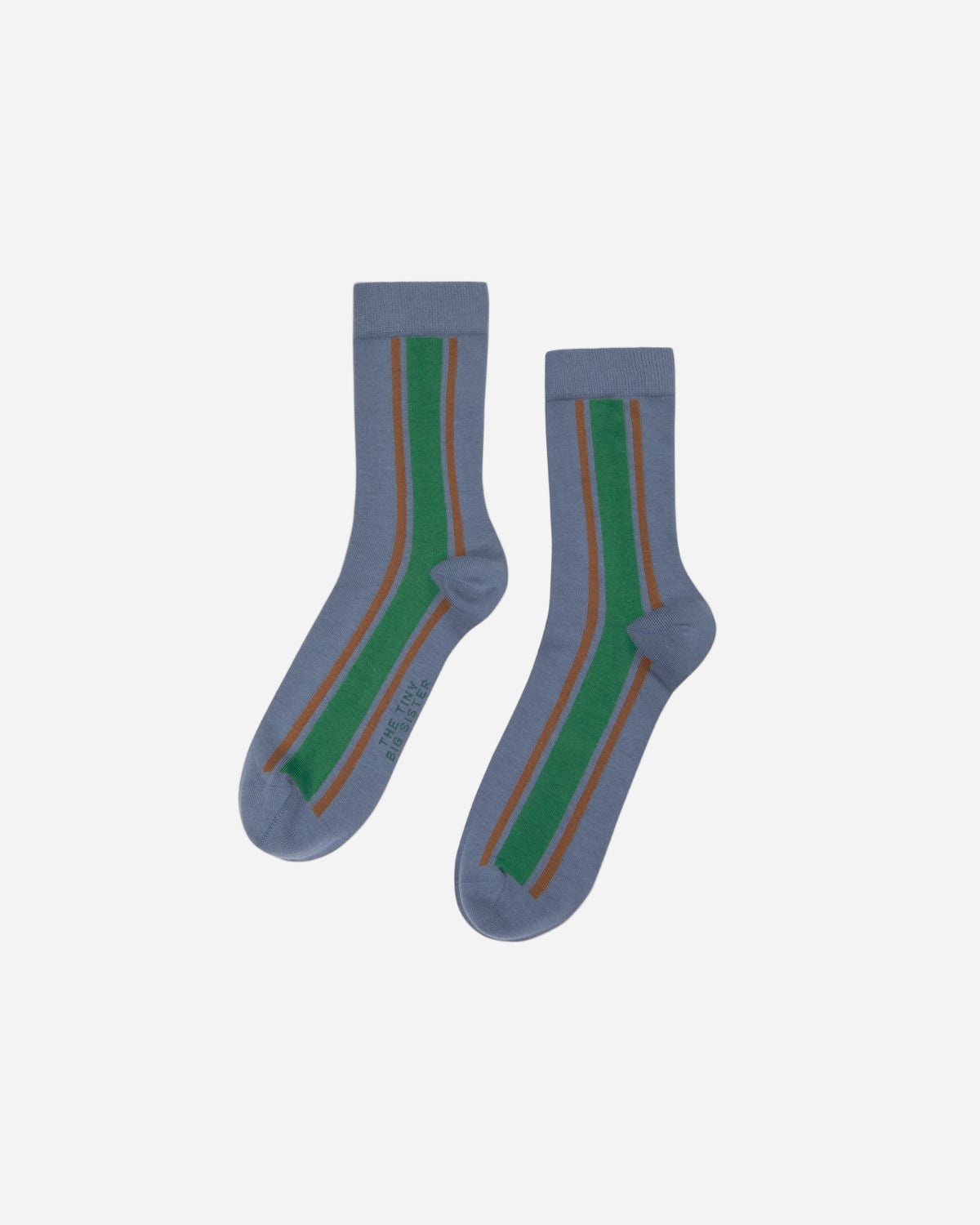 Pair of blue socks with green and brown stripes on a white background