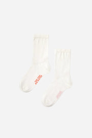White socks with red text on a white background
