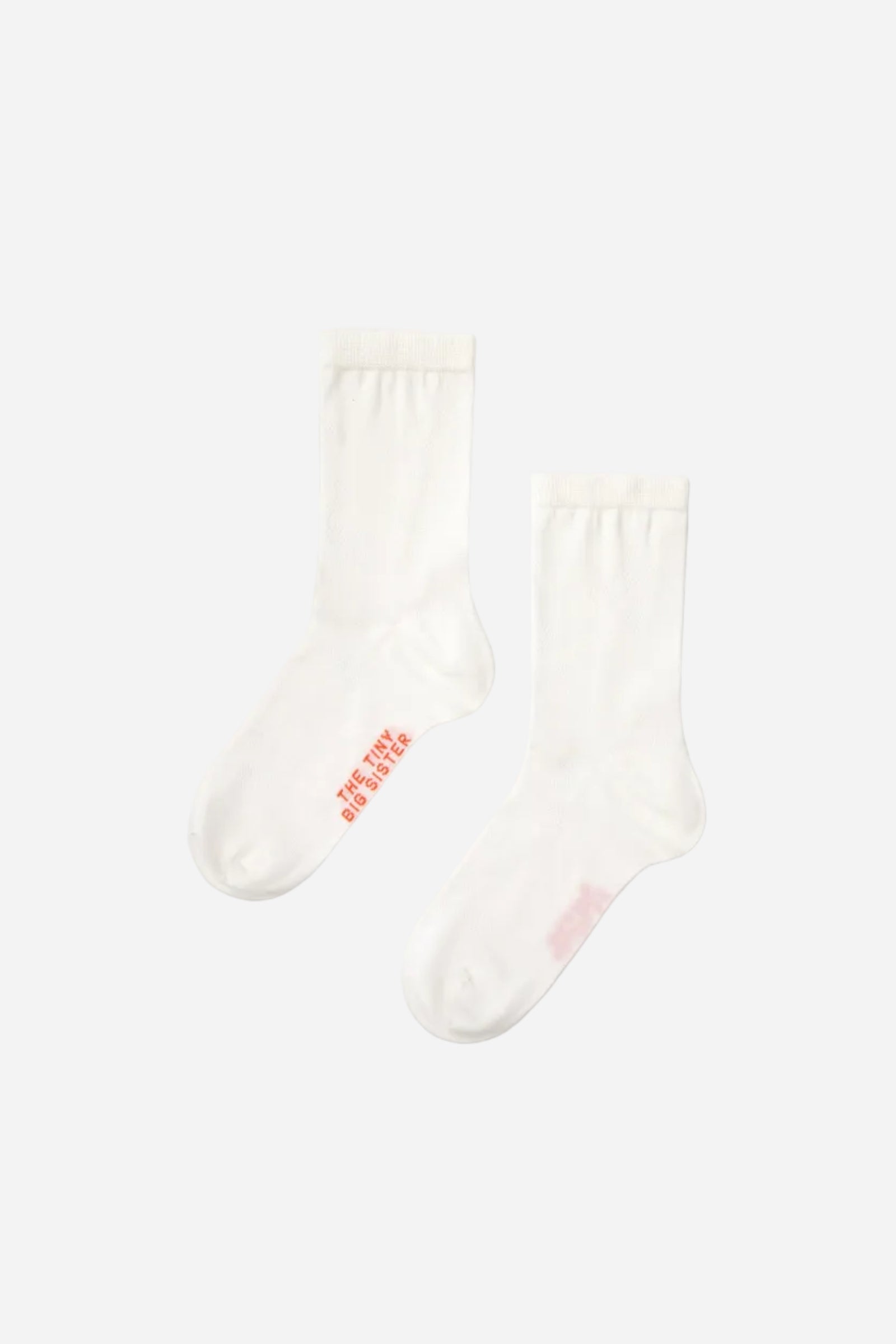 White socks with red text on a white background
