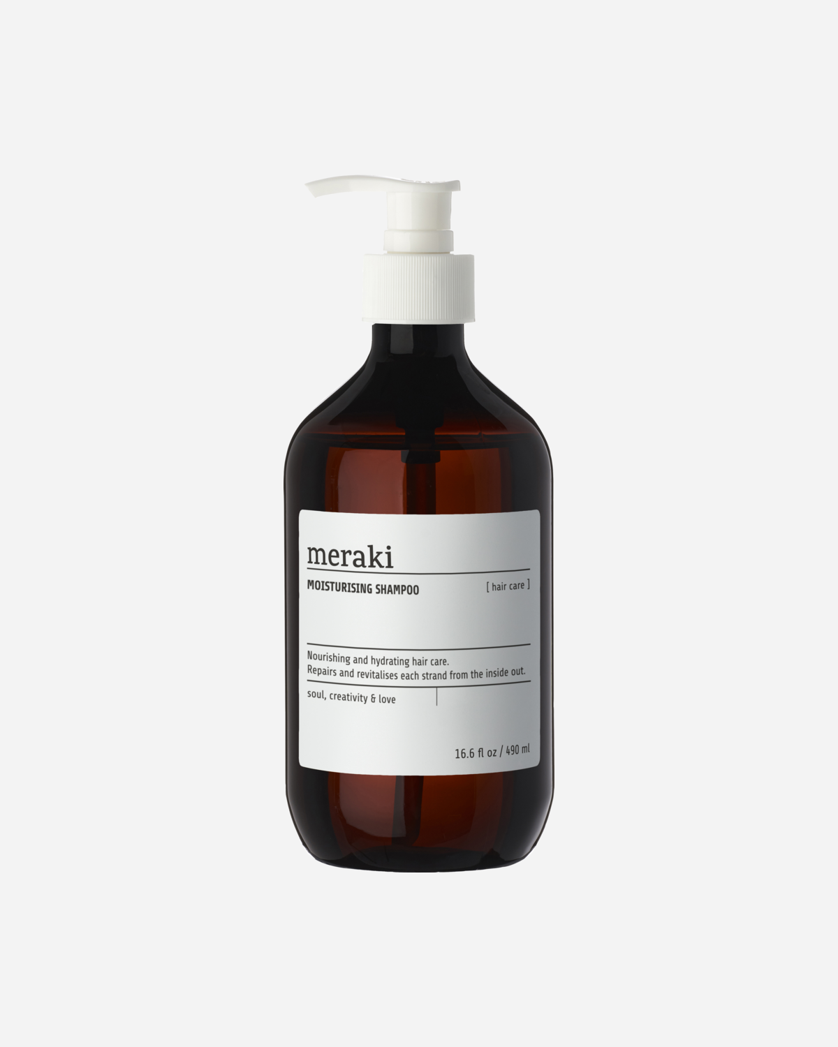 A bottle of Meraki moisturizing shampoo with a white pump dispenser, labeled with the brand's logo and product information. The shampoo is housed in a clear bottle with a dark liquid visible inside.
