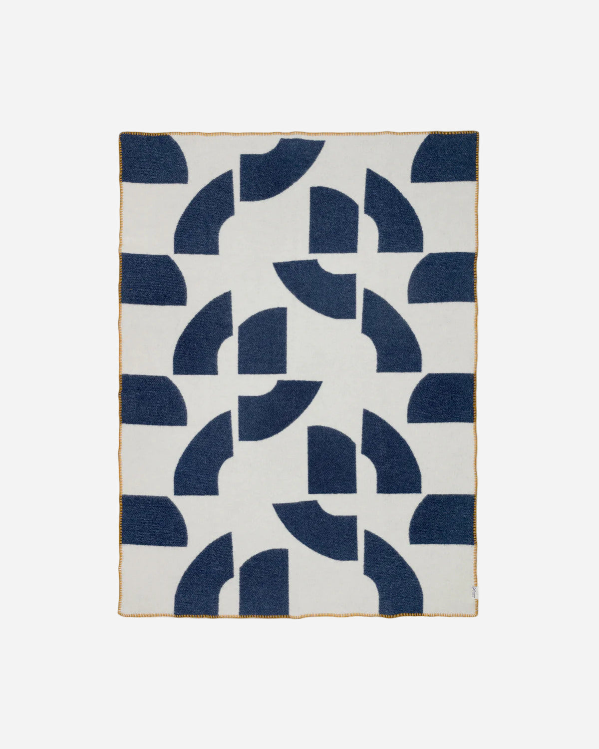 Wool blanket with blue geometric pattern on a white background