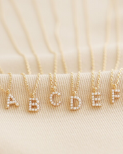 GOLD PLATED TINY PEARL INITIAL NECKLACES