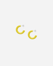 Yellow hoop earrings on a white background